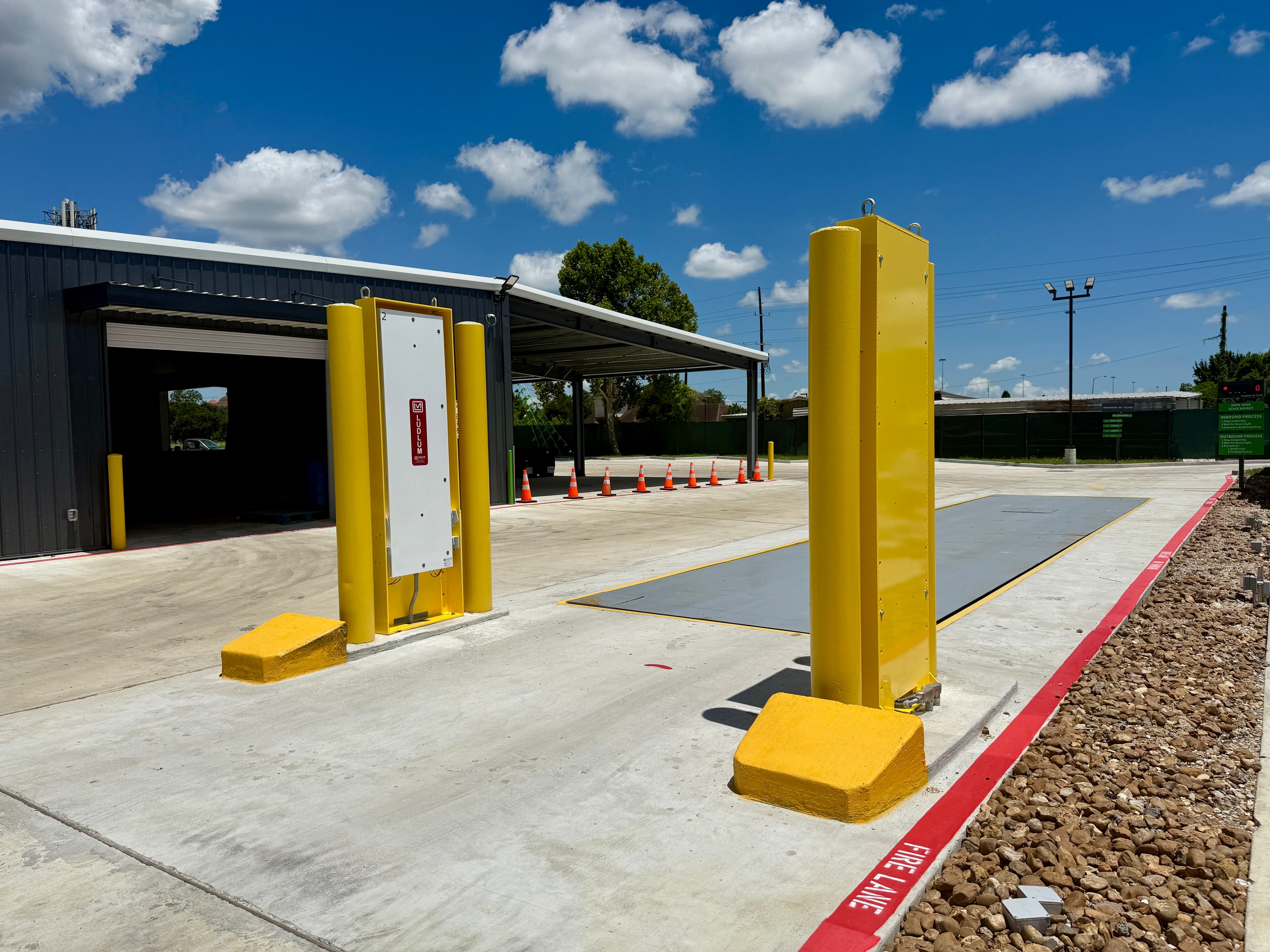 Truck scale with radiation detection stands at Beaumont Recycling